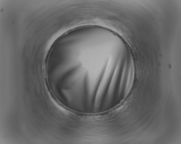 X0000077371519200611031858