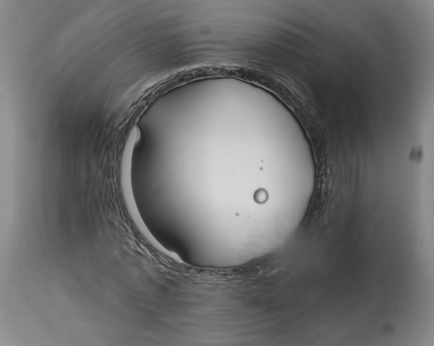 X0000114020773200910231836